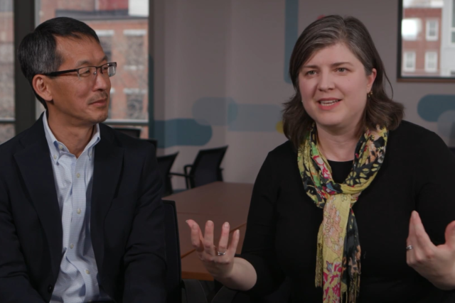 Video still of Roger Nozaki and Yvonne Belanger in conversation.