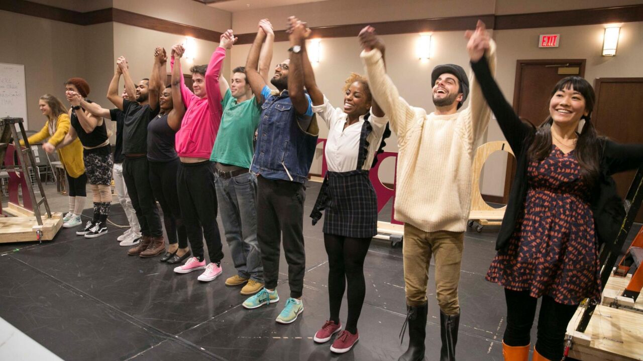Actors take a bow in dress rehearsal.