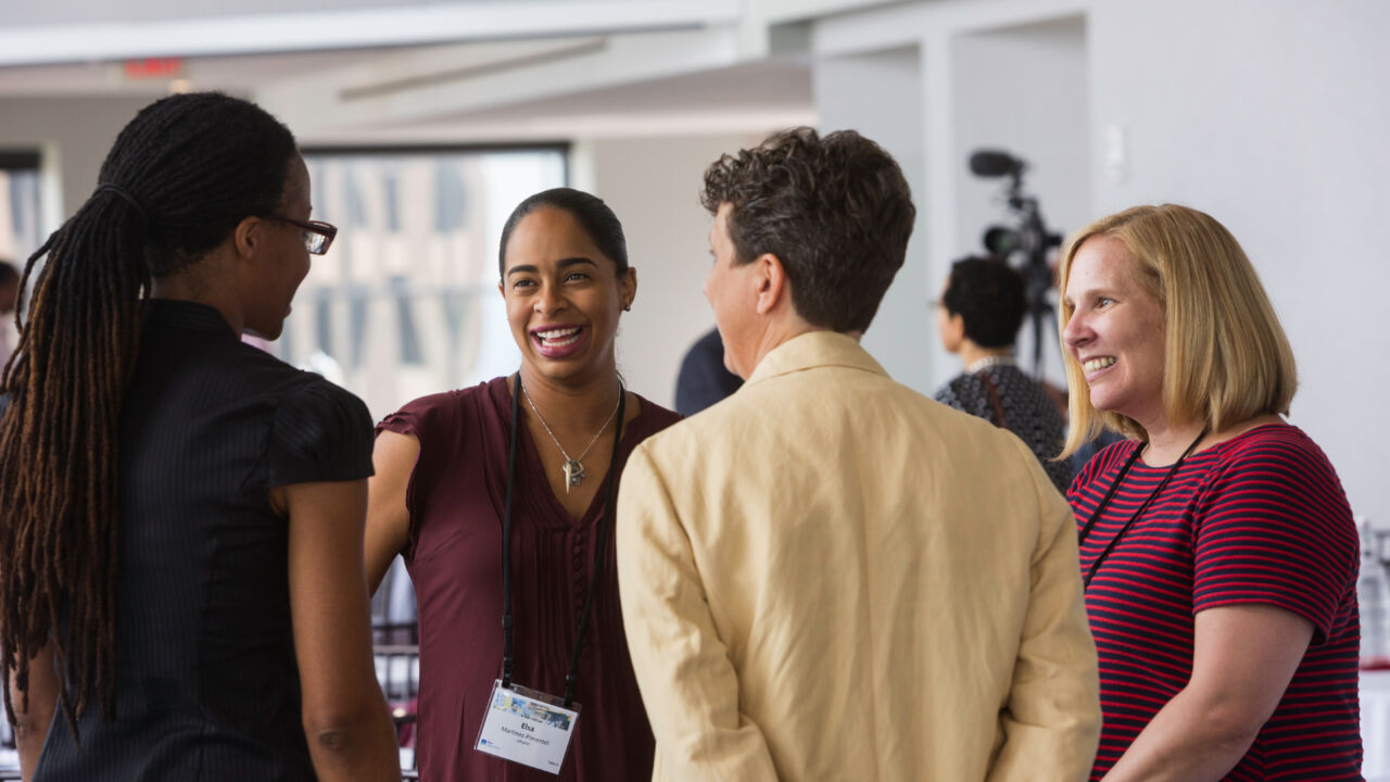 Educators talking at Barr event