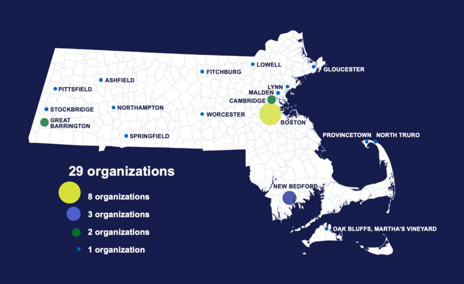 A white map of Massachusetts with a navy blue background and dots showing the geographic location of the 29 organizations participating in the Barr-Klarman Massachusetts Arts Initiative.